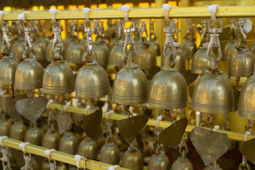 Wall Mural - Small golden bell in a Thai temple