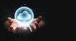 © Dilok - Two hands holding virtual could computing with technology icons with dark background and copy space for technology transformation and sharing concept.