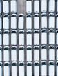 Aerial view of a manufacturer’s stockpile of new white vans parked together