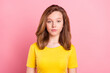 Photo of young attractive school girl serious confident wear yellow t-shirt isolated over pink color background