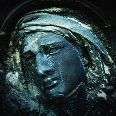 Fototapete - Virgin Mary statue. Fragment of vintage sculpture of sad woman in grief. Religion, faith, suffering, love concept.