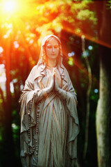 Fototapete - Antique statue of the Virgin Mary praying  (religion, faith, holy, sin concept)