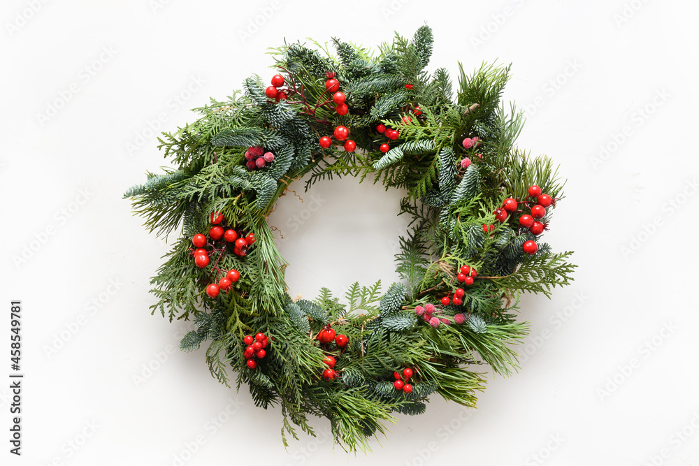 Festive Christmas wreath of fresh natural spruce branches with red ...
