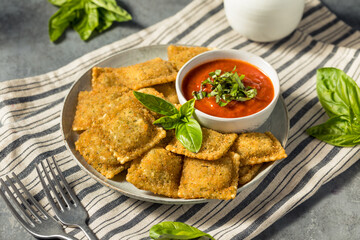 Canvas Print - Homemade Fried Raviolis with Basil