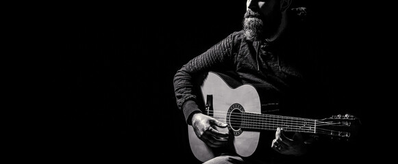 Acoustic guitars playing. Music concept. Guitars acoustic. Live music. Man's hands playing acoustic guitar, close up. Music festival. Male musician playing guitar, music instrument