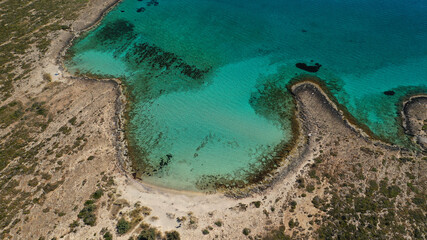 Wall Mural - Aerial drone photo of paradise turquoise secluded sandy beach of Lefki or White in island of Elafonisos next to popular beach of Simos, South Peloponnese, Lakonia, Greece