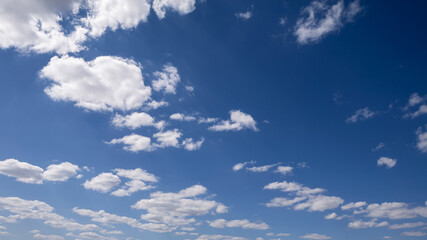 Wall Mural - Cumulus clouds with blue sky on a sunny day of summer. Beautiful cloudscape