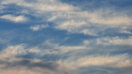 Wall Mural - Cumulus clouds with blue sky on a sunny day of summer. Beautiful cloudscape as nature background panorama. Wonderful weather of natural daylight with white cloud floating, creating a abstract shape