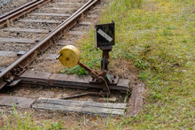 Hand Switch With Lever, Weight And Signal And Old Train Tracks 