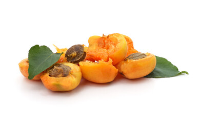 Canvas Print - Apricots and pits with leaves.