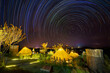 Night sky star trail over the Dome tents in resort on Mon Keing Dao at north of Thailand.