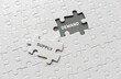 © MohamadFaizal - Selective focus of an empty space of jigsaw puzzle written with Demand and a piece of jigsaw puzzle written with Supply.