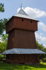 Wall Mural - View of the ancient wooden bell tower of the Church of the Holy Great Martyr Paraskeva in Drohobych. Ukraine 