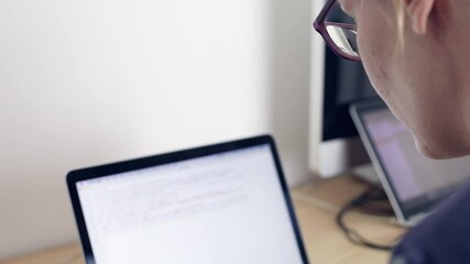 Business woman typing on computer keyboard at office workplace, video footage