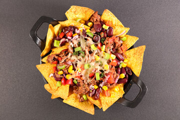 Wall Mural - nachos- tortilla chips with bean,  beef and cheese
