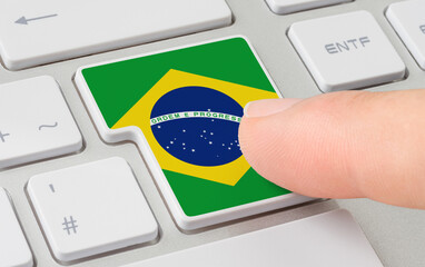Wall Mural - a keyboard with a labeled button - flag of brazil
