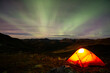 © RolvErik - tent in the mountains under the northern lights