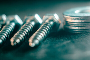 Sticker - Pile of screws on a dark background