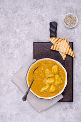 Wall Mural - Curry with vegetables, lentils and meat