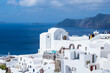 © Martina - Panoramic view of Oia town cityscape at Santorini island in Greece. Traditional white houses. Greece, Aegean sea. Famous European destination