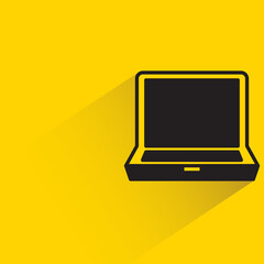 Poster - laptop computer with shadow on yellow background