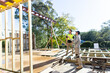 © Austockphoto - Two trades working together to problem solve at a house renovation site