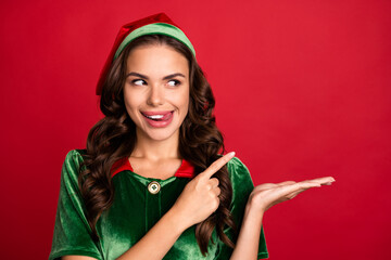 Canvas Print - Photo portrait female elf pointing finger copyspace licking lips isolated vivid red color background copyspace