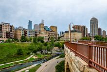 Mill Ruins Park And The Stone Arch Bridge In Minneapolis