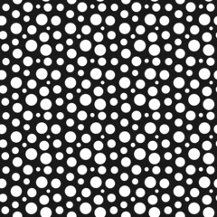 Wall Mural - white dots on black background seamless pattern.