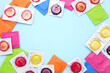 Colorful condoms on blue background