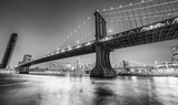 Fototapeta  - The Brooklyn and Manhattan Bridges at night from Broolyn Bridge Park, New York City in winter.