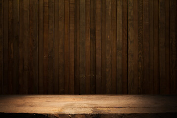 Empty dark wooden table in front of abstract blurred bokeh background of restaurant . can be used for display or montage your products.Mock up for space