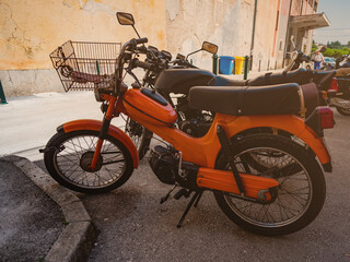 Naklejka na meble moped in the parking lot in the city