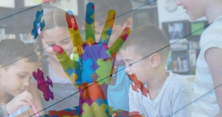 Poster - Animation of colourful puzzle pieces and hand over school children using tablets