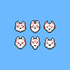 Wall Mural - Pixel art set of japanese fox mask icon.