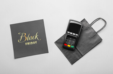 Canvas Print - Shopping bag, payment terminal and card with text BLACK FRIDAY on light background