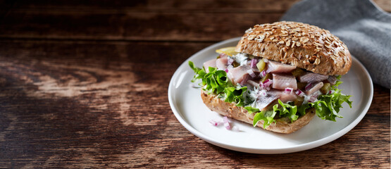 Wall Mural - Tasty sandwich with fish and lettuce