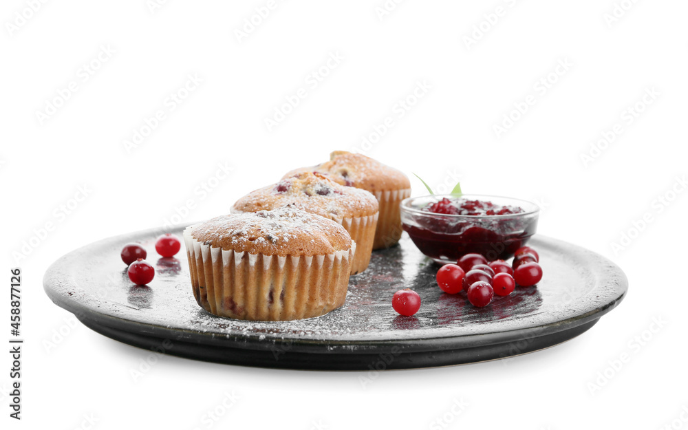 Plate with tasty cranberry muffins on white background