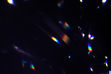 Aufkleber - Blur colorful warm rainbow crystal light leaks on black background. Defocused abstract retro film analog effect for using over photos as overlay or screen filter