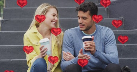 Poster - Animation of heart icons floating over happy caucasian couple talking and drinking takeaway coffee