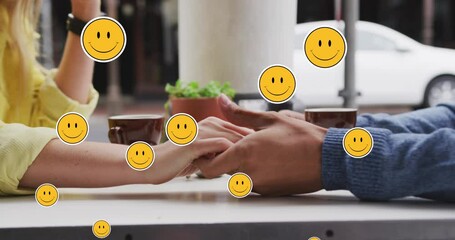 Poster - Animation of digital emoji icons floating over caucasian couple holding hands