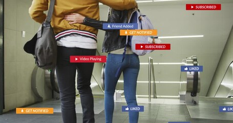 Poster - Animation of social media icons floating over couple embracing on escalators