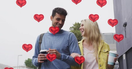 Poster - Animation of heart icons floating over happy caucasian couple walking and drinking takeaway coffee