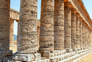 Columns of the ancient ruins of the greek temple of Segesta in Sicily, Italy.