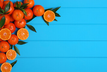 Wall Mural - Orange on wooden background.