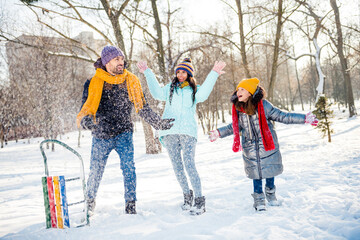 Full size photo of happy excited good mood funky family enjoying winter holiday outdoors throwing snow having fun