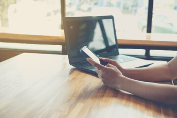 Businessman using mobile smartphone with data information banking network connection on screen, Business report  on computer screen network,working from home