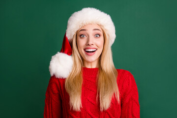 Sticker - Photo portrait blonde woman in santa hat smiling amazed isolated green color background