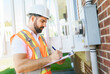 © Louis-Photo - Portrait of an electrician happy worker at work