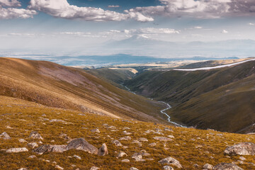 Wall Mural - Spectacular panoramic view of the famous mountain Ararat in Armenia at autumn. Yellow grassy slopes of the gorge and a mountain stream below